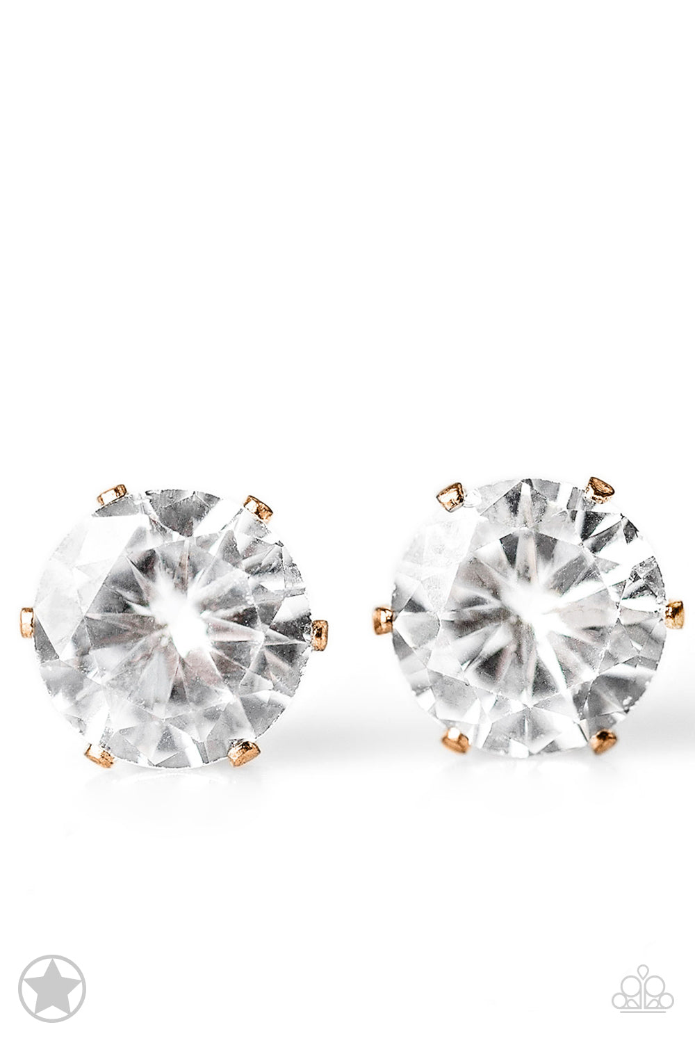 &lt;P&gt;A sparkling white rhinestone is nestled inside a classic gold frame for a timeless look. Earring attaches to a standard post fitting. &lt;/P&gt;  
&lt;P&gt; &lt;I&gt;  Sold as one pair of post earrings.
 &lt;/I&gt;  &lt;/P&gt;

&lt;img style=\&quot;height: 50px; width: 50px;\&quot; src=\&quot;https://d9b54x484lq62.cloudfront.net/paparazzi/shopping/images/517_staricon_1.jpg\&quot; alt=\&quot;BlockbusterLogo\&quot; align=\&quot;middle\&quot; /&gt;&lt;/p&gt;