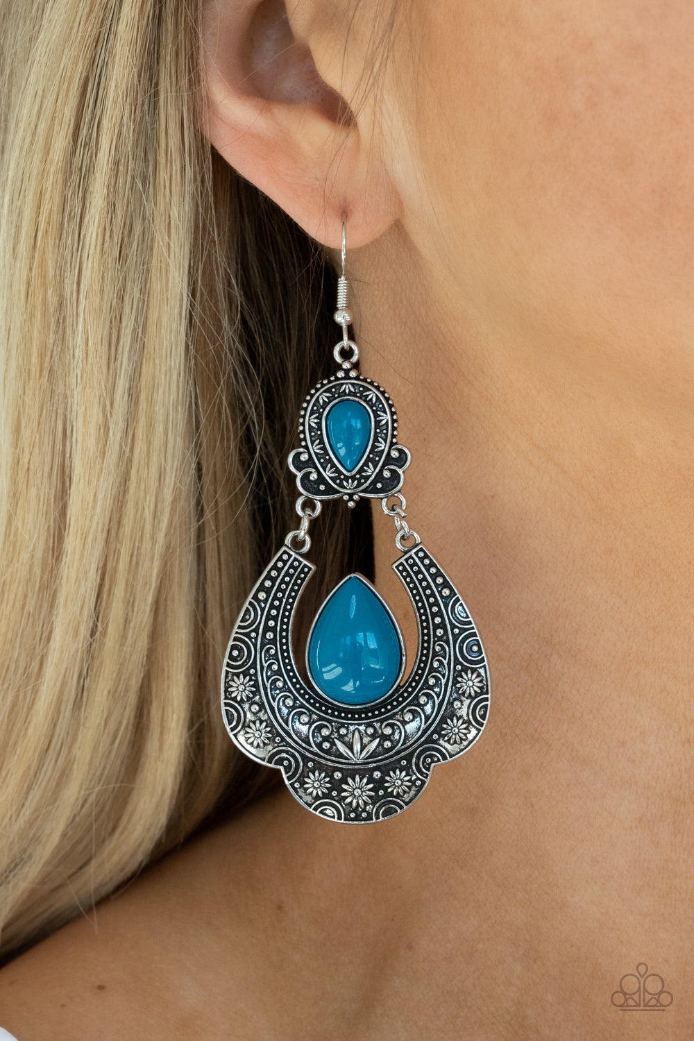 &lt;p&gt;Dotted with blue teardrop beads, two mismatched silver frames with studded and embossed floral inspired textures delicately link into a colorful lure. Earring attaches to a standard fishhook fitting.&lt;/p&gt;  

&lt;p&gt; &lt;i&gt;  Sold as one pair of earrings. &lt;/i&gt;  &lt;/p&gt;



