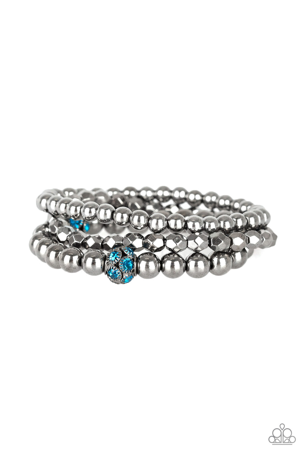 &lt;P&gt;Mismatched gunmetal beads and blue rhinestone encrusted beads are threaded along stretchy bands for an edgy and refined look. &lt;/P&gt;

&lt;P&gt;&lt;I&gt; Sold as one set of three bracelets. &lt;/I&gt;&lt;/p&gt;


&lt;img src=\&quot;https://d9b54x484lq62.cloudfront.net/paparazzi/shopping/images/517_tag150x115_1.png\&quot; alt=\&quot;New Kit\&quot; align=\&quot;middle\&quot; height=\&quot;50\&quot; width=\&quot;50\&quot;/&gt;