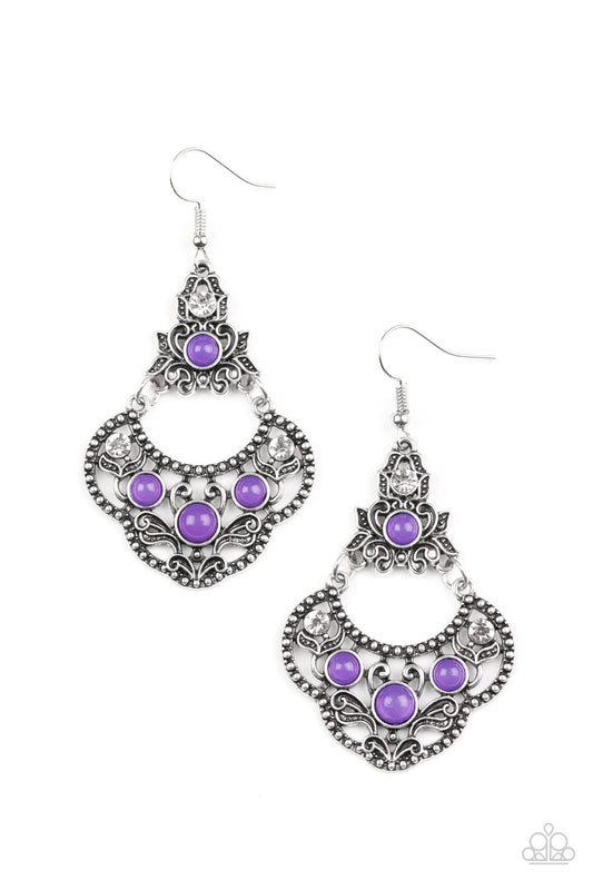 &lt;P&gt;Glowing purple beads and glittery white rhinestones are sprinkled along an ornate silver frame radiating with leafy filigree for a whimsical look. Earring attaches to a standard fishhook fitting. &lt;/P&gt;  

&lt;P&gt; &lt;I&gt;  Sold as one pair of earrings. &lt;/I&gt;  &lt;/P&gt;

&lt;img src=\&quot;https://d9b54x484lq62.cloudfront.net/paparazzi/shopping/images/517_tag150x115_1.png\&quot; alt=\&quot;New Kit\&quot; align=\&quot;middle\&quot; height=\&quot;50\&quot; width=\&quot;50\&quot;/&gt;