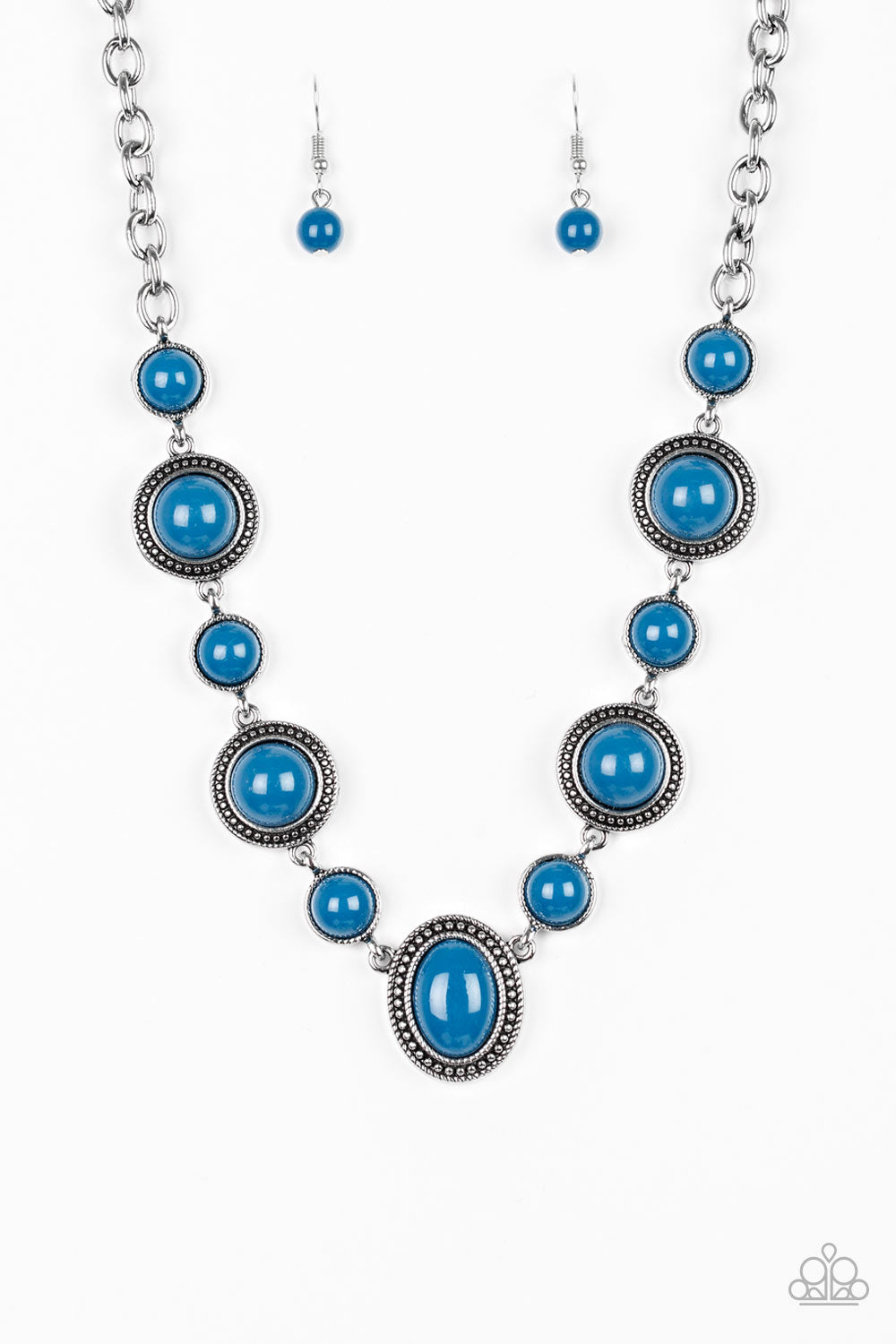 &lt;P&gt;Featuring smooth and studded silver frames, refreshing blue beads link below the collar in a seasonal fashion. Features an adjustable clasp closure.&lt;/p&gt;

&lt;P&gt;&lt;i&gt; Sold as one individual necklace.  Includes one pair of matching earrings.
&lt;/i&gt;&lt;/p&gt;

&lt;img src=\&quot;https://d9b54x484lq62.cloudfront.net/paparazzi/shopping/images/517_tag150x115_1.png\&quot; alt=\&quot;New Kit\&quot; align=\&quot;middle\&quot; height=\&quot;50\&quot; width=\&quot;50\&quot;/&gt;