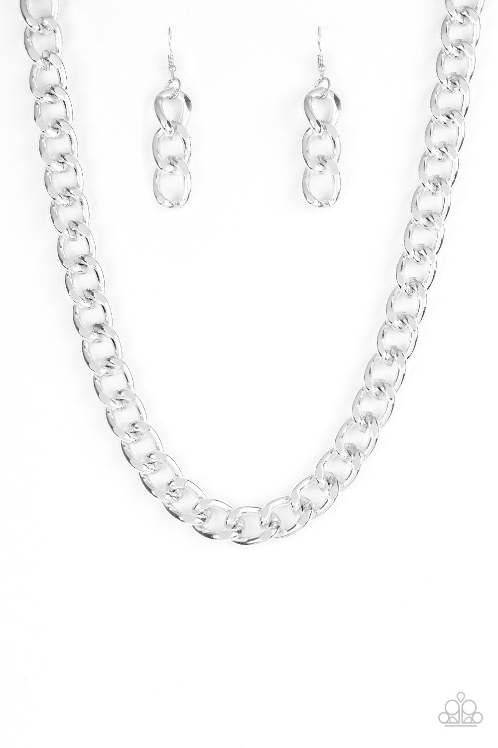 &lt;P&gt;Brushed in a high-sheen shimmer, a bold silver chain drapes below the collar in an edgy industrial fashion. Features an adjustable clasp closure.&lt;/p&gt;

&lt;P&gt;&lt;i&gt; Sold as one individual necklace.  Includes one pair of matching earrings.
&lt;/i&gt;&lt;/p&gt;

&lt;img src=\&quot;https://d9b54x484lq62.cloudfront.net/paparazzi/shopping/images/517_tag150x115_1.png\&quot; alt=\&quot;New Kit\&quot; align=\&quot;middle\&quot; height=\&quot;50\&quot; width=\&quot;50\&quot;/&gt;