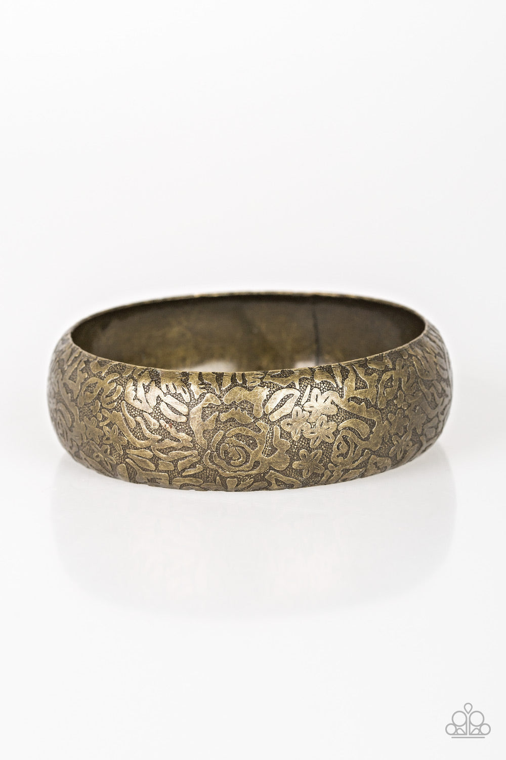&lt;P&gt;Brushed in an antiqued finish, a rosy floral pattern is embossed across a thick brass bangle for a seasonal flair. &lt;/P&gt;

&lt;P&gt;&lt;I&gt; Sold as one individual bracelet.&lt;/I&gt;&lt;/p&gt;


&lt;img src=\&quot;https://d9b54x484lq62.cloudfront.net/paparazzi/shopping/images/517_tag150x115_1.png\&quot; alt=\&quot;New Kit\&quot; align=\&quot;middle\&quot; height=\&quot;50\&quot; width=\&quot;50\&quot;/&gt;