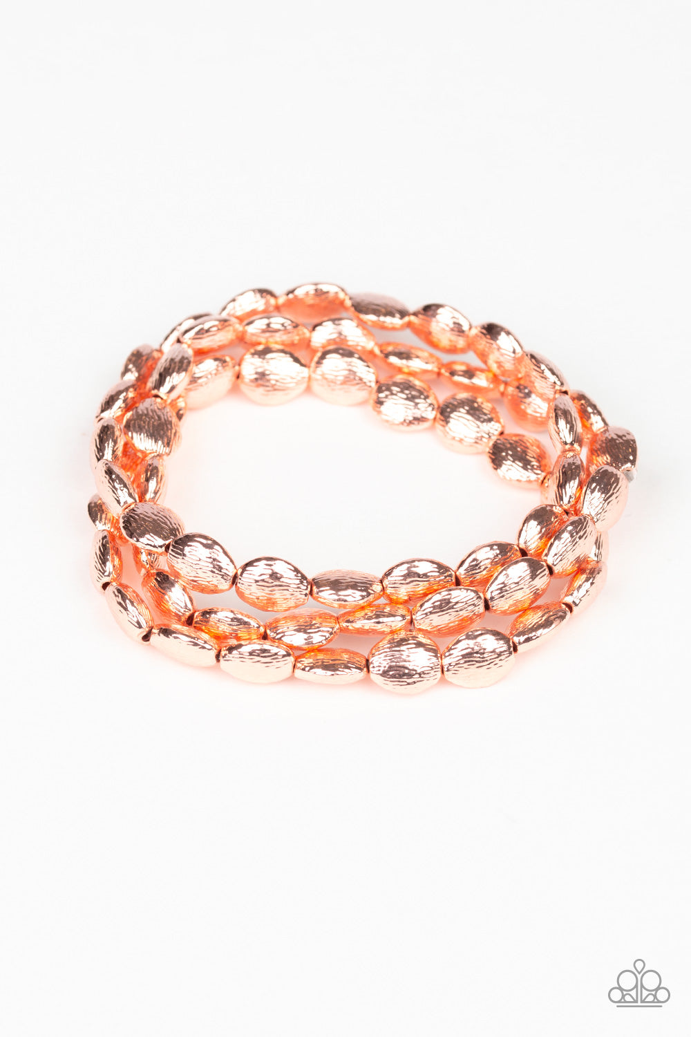 &lt;P&gt;Radiating with shimmery textures, dainty shiny copper beads are threaded along stretchy bands around the wrist for a casually layered look.&lt;/P&gt; 

&lt;P&gt; &lt;I&gt;Sold as one set of three bracelets.&lt;/I&gt;  &lt;/P&gt;

&lt;imgsrc=\&quot;https://d9b54x484lq62.cloudfront.net/paparazzi/shopping/images/517_tag150x115_1.png\&quot; alt=\&quot;New Kit\&quot; align=\&quot;middle\&quot; height=\&quot;50\&quot; width=\&quot;50\&quot;/&gt;