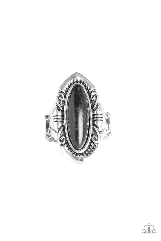 &lt;P&gt;An oblong black stone is pressed into the center of an antiqued silver band swirling with tribal inspired patterns for a seasonal finish. Features a stretchy band for a flexible fit.
&lt;/P&gt;  

&lt;P&gt; &lt;I&gt; Sold as one individual ring.  &lt;/I&gt;  &lt;/P&gt;

&lt;img src=\&quot;https://d9b54x484lq62.cloudfront.net/paparazzi/shopping/images/517_tag150x115_1.png\&quot; alt=\&quot;New Kit\&quot; align=\&quot;middle\&quot; height=\&quot;50\&quot; width=\&quot;50\&quot;/&gt;