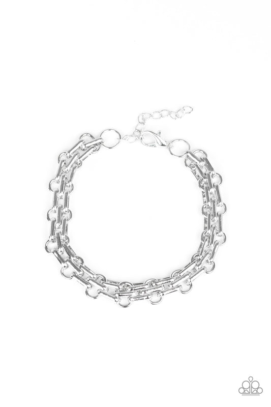 &lt;P&gt;Doubled silver links connect around the wrist for an abstract urban look. Features an adjustable clasp closure.
&lt;/P&gt;  

&lt;P&gt; &lt;I&gt;Sold as one individual bracelet. &lt;/I&gt;&lt;/P&gt;

&lt;img src=\&quot;https://d9b54x484lq62.cloudfront.net/paparazzi/shopping/images/517_tag150x115_1.png\&quot; alt=\&quot;New Kit\&quot; align=\&quot;middle\&quot; height=\&quot;50\&quot; width=\&quot;50\&quot;/&gt;