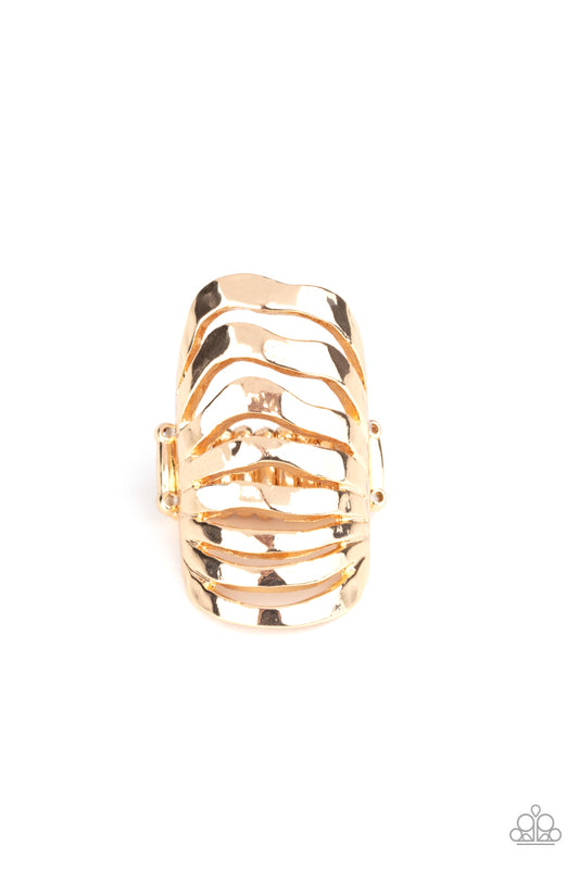 &lt;P&gt;Delicately hammered gold bands ripple across the finger, stacking into a boldly layered look for an edgy industrial finish. Features a stretchy band for a flexible fit.
&lt;/P&gt;  

&lt;P&gt; &lt;I&gt;  Sold as one individual ring.
&lt;/I&gt;&lt;/P&gt;

&lt;img src=\&quot;https://d9b54x484lq62.cloudfront.net/paparazzi/shopping/images/517_tag150x115_1.png\&quot; alt=\&quot;New Kit\&quot; align=\&quot;middle\&quot; height=\&quot;50\&quot; width=\&quot;50\&quot;/&gt;