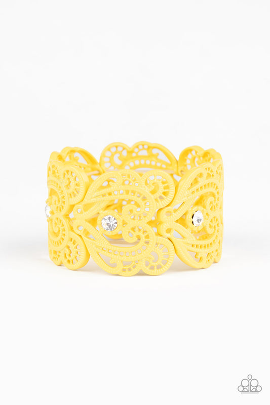 &lt;P&gt;Painted in a sunny yellow finish, lacy metallic frames are threaded along stretchy bands around the wrist. Glassy white rhinestones dot each frame, adding elegant shimmer to the whimsical piece.&lt;/P&gt;  

&lt;P&gt; &lt;I&gt;Sold as one individual bracelet.&lt;/I&gt;  &lt;/P&gt;


&lt;img src=\&quot;https://d9b54x484lq62.cloudfront.net/paparazzi/shopping/images/517_tag150x115_1.png\&quot; alt=\&quot;New Kit\&quot; align=\&quot;middle\&quot; height=\&quot;50\&quot; width=\&quot;50\&quot;/&gt;