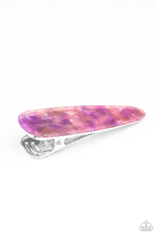 &lt;P&gt;Speckled in iridescent accents, a thick acrylic frame clips back the hair for a colorfully retro look. Features a standard hair clip on the back. Color may vary.&lt;/P&gt;

&lt;P&gt;&lt;I&gt;Sold as one individual hair clip.  &lt;/I&gt;&lt;/P&gt;


&lt;img src=\&quot;https://d9b54x484lq62.cloudfront.net/paparazzi/shopping/images/517_tag150x115_1.png\&quot; alt=\&quot;New Kit\&quot; align=\&quot;middle\&quot; height=\&quot;50\&quot; width=\&quot;50\&quot;/&gt;