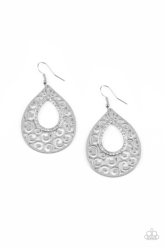 &lt;P&gt;Encrusted in glittery white rhinestones, a teardrop silhouette is pressed into an airy silver backdrop of whimsical filigree for a casual look. Earring attaches to a standard fishhook fitting.&lt;/P&gt;  

&lt;P&gt; &lt;I&gt;  Sold as one pair of earrings. &lt;/I&gt;  &lt;/P&gt;


&lt;img src=\&quot;https://d9b54x484lq62.cloudfront.net/paparazzi/shopping/images/517_tag150x115_1.png\&quot; alt=\&quot;New Kit\&quot; align=\&quot;middle\&quot; height=\&quot;50\&quot; width=\&quot;50\&quot;/&gt;