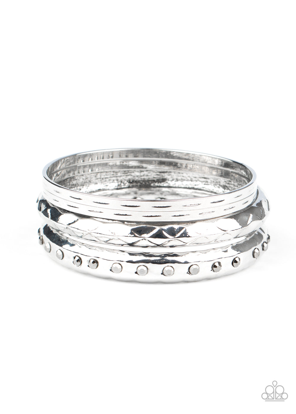 &lt;P&gt;A stack of silver bangles is hammered in texture, creating light-catching edges that reflect an immense amount of shine. One bangle is lined with smoky hematite rhinestones, adding a hint of twinkle. &lt;/P&gt;

&lt;P&gt;&lt;I&gt; Sold as one set of four bracelets.&lt;/I&gt;&lt;/p&gt;

&lt;img src=\&quot;https://d9b54x484lq62.cloudfront.net/paparazzi/shopping/images/517_tag150x115_1.png\&quot; alt=\&quot;New Kit\&quot; align=\&quot;middle\&quot; height=\&quot;50\&quot; width=\&quot;50\&quot;/&gt;