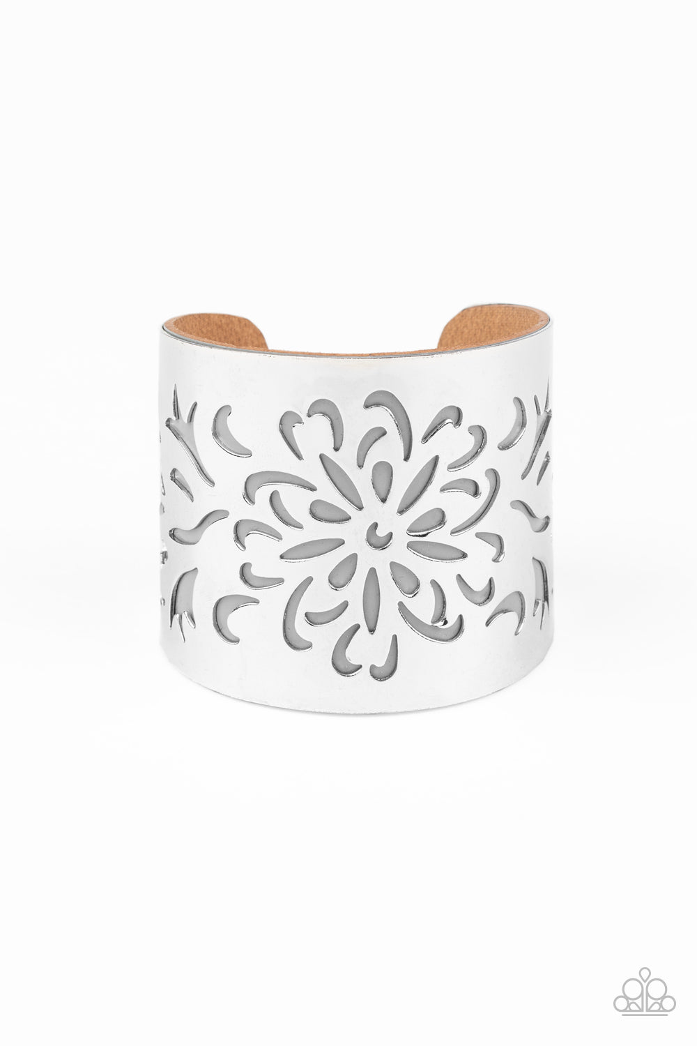 &lt;P&gt;A thick piece of Ash leather peeks out beneath an airy floral pattern stenciled into a thick silver cuff, creating a whimsical display around the wrist.&lt;/P&gt;  

&lt;P&gt; &lt;I&gt;Sold as one individual bracelet.&lt;/I&gt;  &lt;/P&gt;


&lt;img src=\&quot;https://d9b54x484lq62.cloudfront.net/paparazzi/shopping/images/517_tag150x115_1.png\&quot; alt=\&quot;New Kit\&quot; align=\&quot;middle\&quot; height=\&quot;50\&quot; width=\&quot;50\&quot;/&gt;
