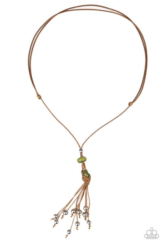 &lt;P&gt; Infused with silver beaded tassels, shiny brown cording knots around glassy green beads at the bottom of a lengthened brown cord for a whimsical look. Features an adjustable sliding knot closure.&lt;/p&gt;

&lt;P&gt;&lt;i&gt; Sold as one individual necklace.
&lt;/i&gt;&lt;/p&gt;

&lt;img src=\&quot;https://d9b54x484lq62.cloudfront.net/paparazzi/shopping/images/517_tag150x115_1.png\&quot; alt=\&quot;New Kit\&quot; align=\&quot;middle\&quot; height=\&quot;50\&quot; width=\&quot;50\&quot;/&gt;