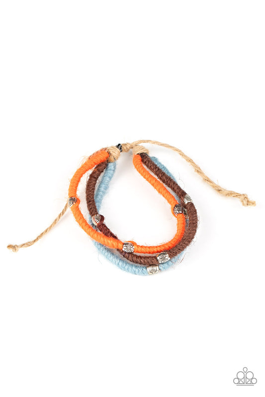 &lt;P&gt;Featuring brown, blue, and Amberglow hues, silver beaded hemp-like cording wraps into three colorful strands around the wrist for a seasonal flair. Features an adjustable sliding knot closure.&lt;/P&gt;  

&lt;P&gt; &lt;I&gt;Sold as one individual bracelet.&lt;/I&gt;  &lt;/P&gt;


&lt;img src=\&quot;https://d9b54x484lq62.cloudfront.net/paparazzi/shopping/images/517_tag150x115_1.png\&quot; alt=\&quot;New Kit\&quot; align=\&quot;middle\&quot; height=\&quot;50\&quot; width=\&quot;50\&quot;/&gt;