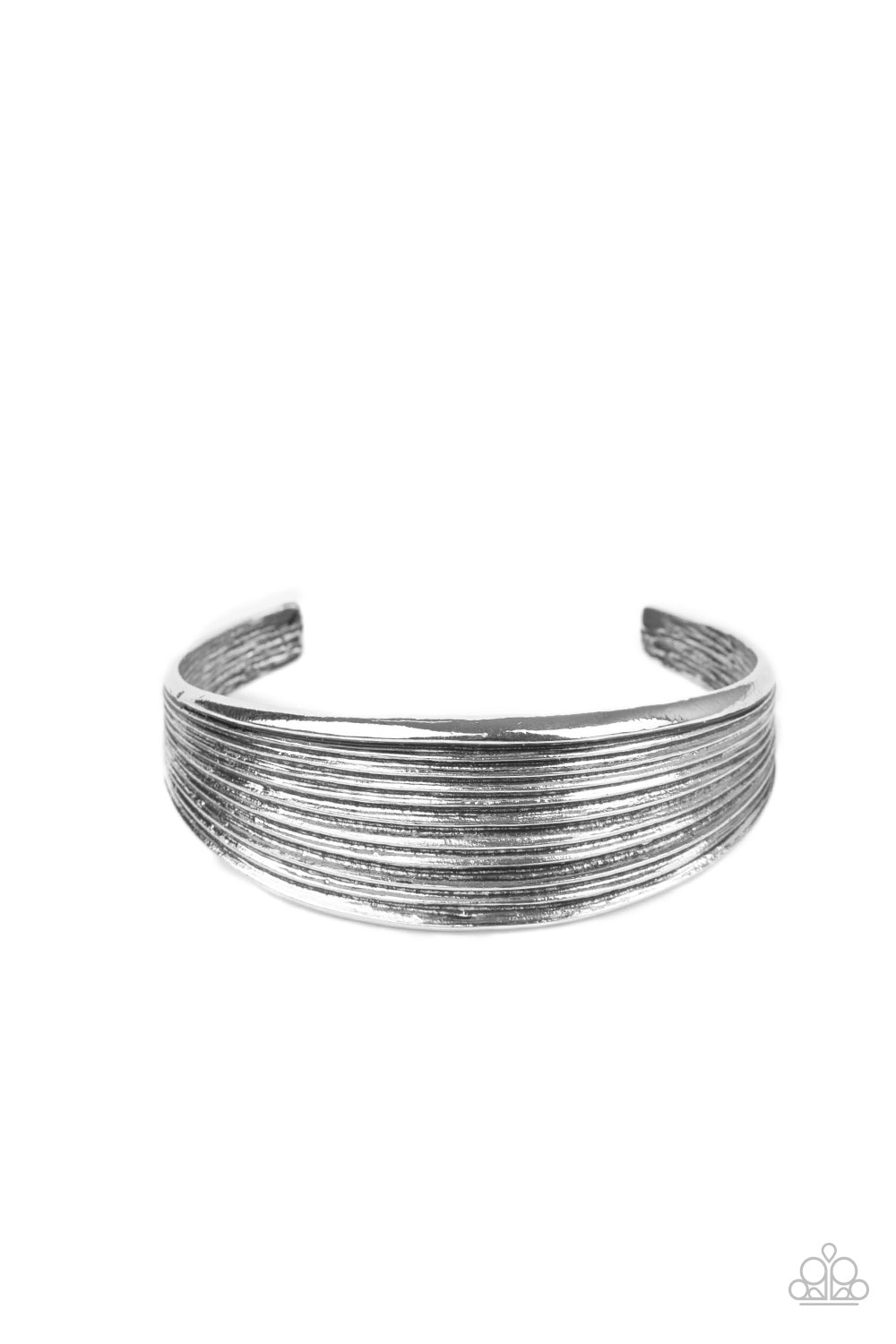 &lt;P&gt;Featuring beveled linear texture, a thick silver cuff delicately curls around the wrist for a dash of rustic refinement.
 &lt;/P&gt;

&lt;P&gt;&lt;I&gt; Sold as one individual bracelet.&lt;/I&gt;&lt;/p&gt;


&lt;img src=\&quot;https://d9b54x484lq62.cloudfront.net/paparazzi/shopping/images/517_tag150x115_1.png\&quot; alt=\&quot;New Kit\&quot; align=\&quot;middle\&quot; height=\&quot;50\&quot; width=\&quot;50\&quot;/&gt;