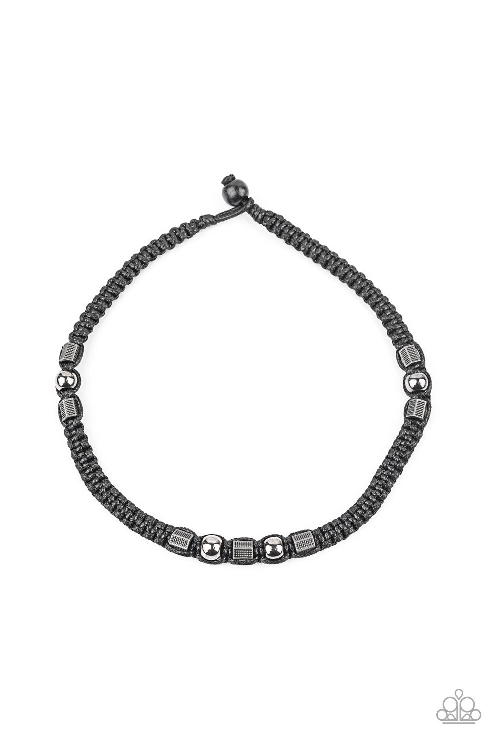 &lt;P&gt;Sections of gunmetal beads and studded hexagonal accents are knotted in place along a black cord that has been braided around the neck for a seasonal look. Features a button loop closure. &lt;/p&gt;

&lt;P&gt;&lt;i&gt; Sold as one individual necklace.
&lt;/i&gt;&lt;/p&gt;

&lt;img src=\&quot;https://d9b54x484lq62.cloudfront.net/paparazzi/shopping/images/517_tag150x115_1.png\&quot; alt=\&quot;New Kit\&quot; align=\&quot;middle\&quot; height=\&quot;50\&quot; width=\&quot;50\&quot;/&gt;