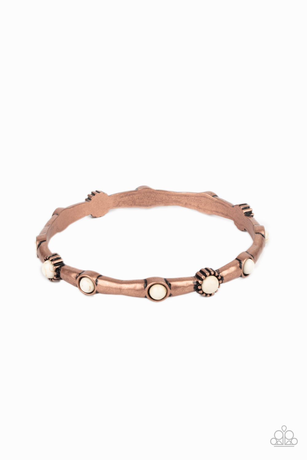 &lt;P&gt; Dotted with dainty white stones, a hammered copper bangle glides along the wrist for a colorfully earthy look.&lt;/P&gt;  

&lt;P&gt; &lt;I&gt;Sold as one individual bracelet.&lt;/I&gt;  &lt;/P&gt;


&lt;img src=\&quot;https://d9b54x484lq62.cloudfront.net/paparazzi/shopping/images/517_tag150x115_1.png\&quot; alt=\&quot;New Kit\&quot; align=\&quot;middle\&quot; height=\&quot;50\&quot; width=\&quot;50\&quot;/&gt;