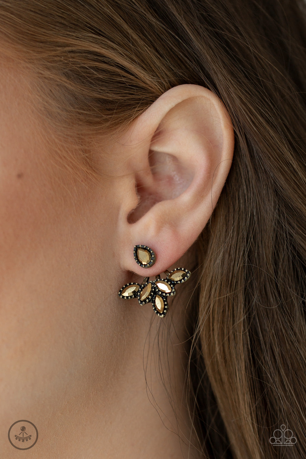 &lt;p&gt;A solitaire teardrop aurum rhinestone attaches to a double-sided post, designed to fasten behind the ear. Encrusted in matching aurum rhinestones, a double-sided post peeks out beneath the ear, creating a glittery fringe. Earring attaches to a standard post fitting.

 &lt;/p&gt;

&lt;p&gt; &lt;i&gt;Sold as one pair of double-sided post earrings.&lt;/i&gt;&lt;/p&gt;


