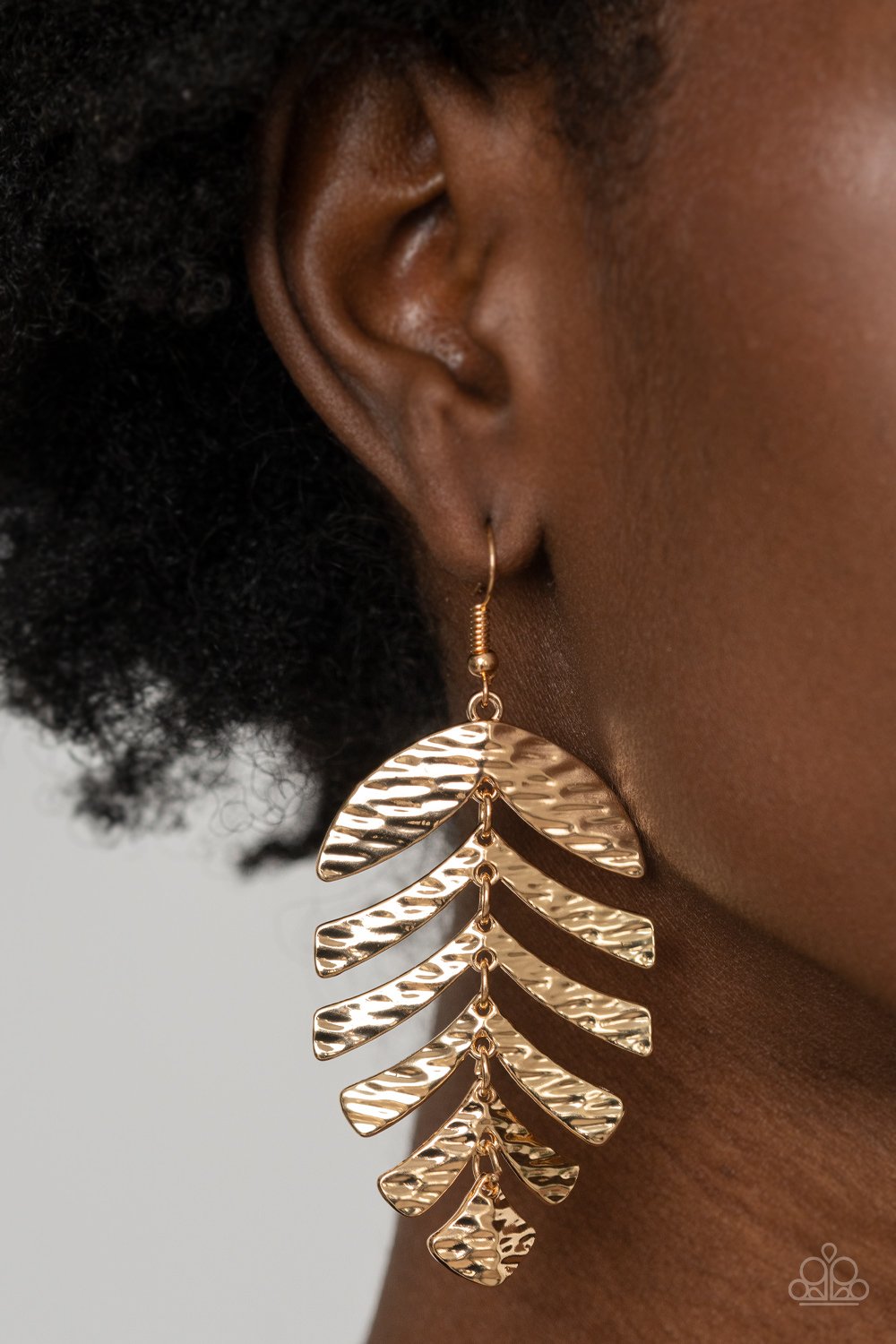 &lt;p&gt; Rippling with tactile textures, dainty gold frames link into a dancing palm leaf for a simply seasonal fashion. Earring attaches to a standard fishhook fitting.&lt;/p&gt;  
 

 &lt;p&gt; &lt;i&gt; Sold as one pair of earrings. &lt;/i&gt; &lt;/p&gt;
 

&lt;h5&gt;Paparazzi Accessories • $5 Jewelry&lt;/h5&gt;