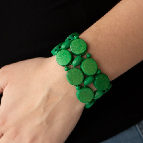 &lt;meta charset=\&quot;UTF-8\&quot;&gt;
&lt;p&gt;Earthy green wooden discs and beads are threaded along braided stretchy bands around the wrist, creating a summery display.&lt;/p&gt;
&lt;p&gt;&lt;i&gt;Sold as one individual bracelet.&lt;/i&gt;&lt;/p&gt;
&lt;p&gt;&amp;nbsp;&lt;/p&gt;