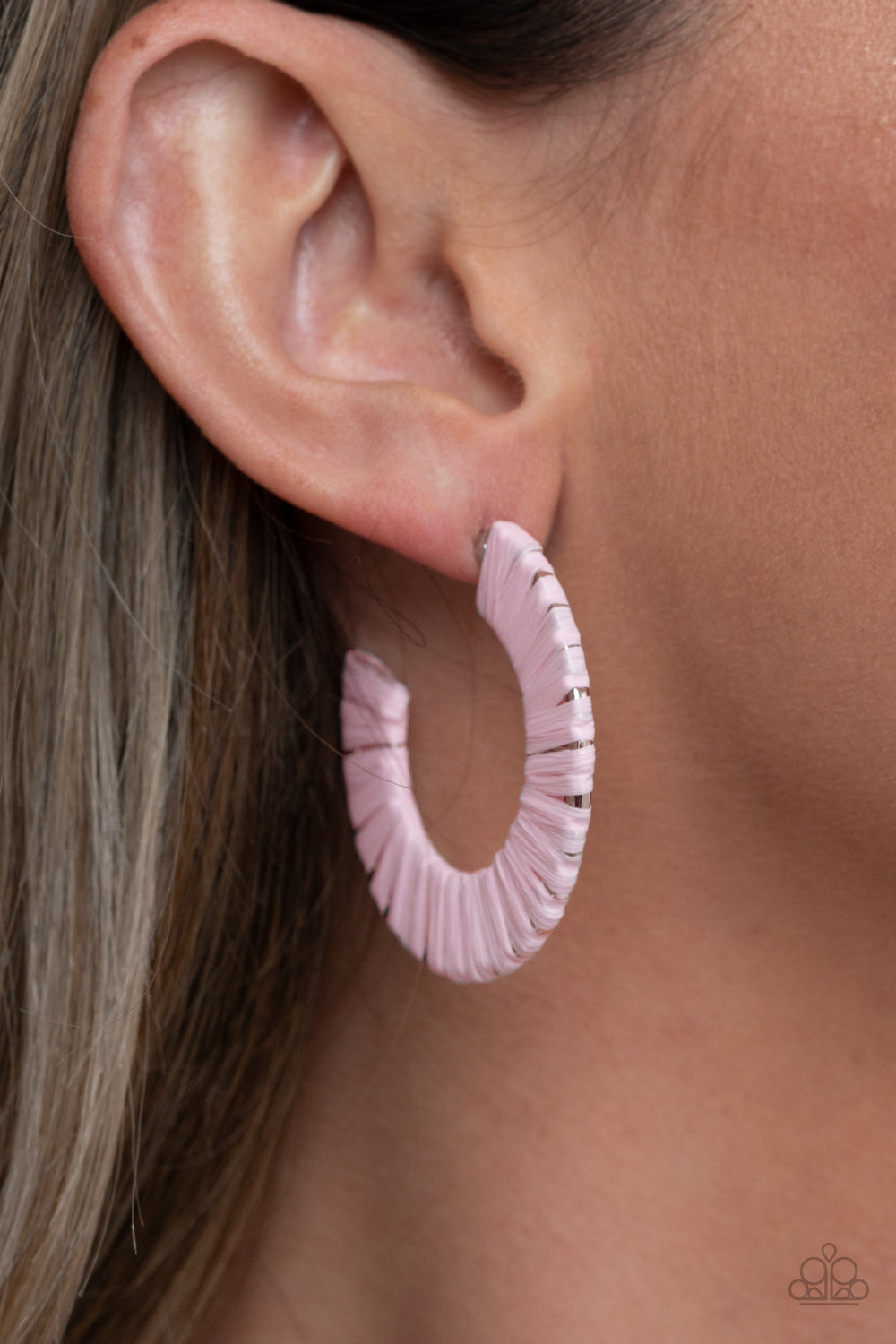 &lt;p&gt;Pink wicker-like cording wraps around a thick silver hoop, creating a flirty pop of color. Earring attaches to a standard post fitting. Hoop measures approximately 1 1/2\&quot; in diameter. &lt;/p&gt;  

&lt;p&gt; &lt;i&gt;  Sold as one pair of hoop earrings. &lt;/i&gt;  &lt;/p&gt;


