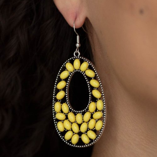 &lt;p&gt; A collection of oval Illuminating beads collect inside a studded silver oval frame, creating a bright pop of color. Earring attaches to a standard fishhook fitting.
&lt;/p&gt;  

&lt;p&gt; &lt;i&gt;  Sold as one pair of earrings. &lt;/i&gt;  &lt;/p&gt;


