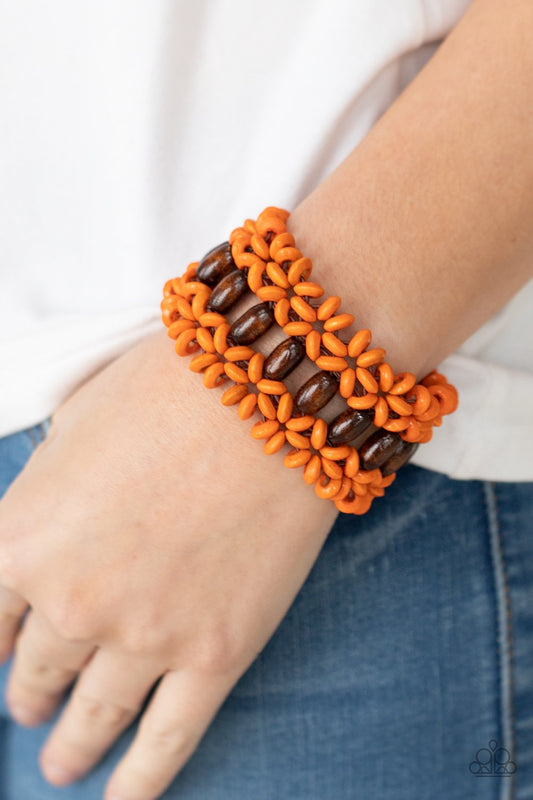 &lt;p&gt; Orange wooden discs and brown wooden beads are threaded along braided stretchy bands around the wrist, creating a colorful tropical display.&lt;/p&gt;

&lt;p&gt;&lt;i&gt; Sold as one individual bracelet.&lt;/i&gt;&lt;/p&gt;


&lt;img src=\&quot;https://d9b54x484lq62.cloudfront.net/paparazzi/shopping/images/517_tag150x115_1.png\&quot; alt=\&quot;New Kit\&quot; align=\&quot;middle\&quot; height=\&quot;50\&quot; width=\&quot;50\&quot;&gt;