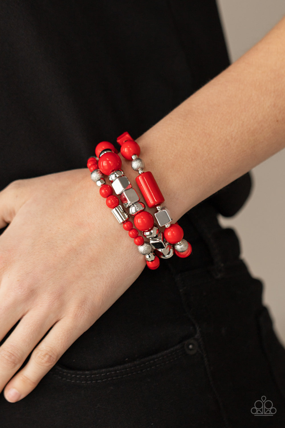 &lt;p&gt;Featuring round, cube, and faceted shapes, a colorful collection of Red Maple and silver beads are threaded along stretchy bands around the wrist, creating vivacious layers.&lt;/p&gt;  

&lt;p&gt; &lt;i&gt;Sold as one set of three bracelets.&lt;/i&gt;  &lt;/p&gt;


